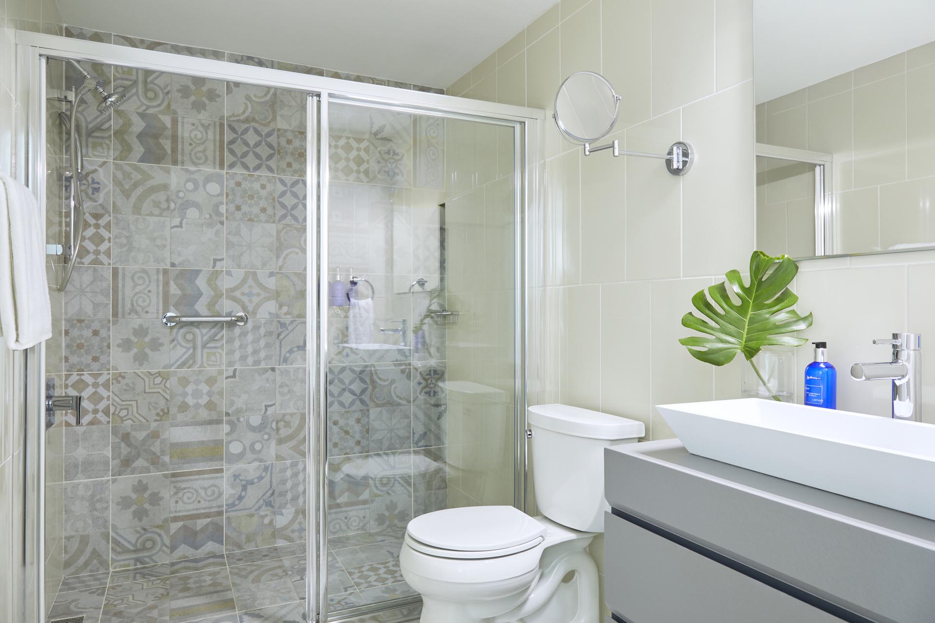 Bathroom with a sink, toilet, and shower