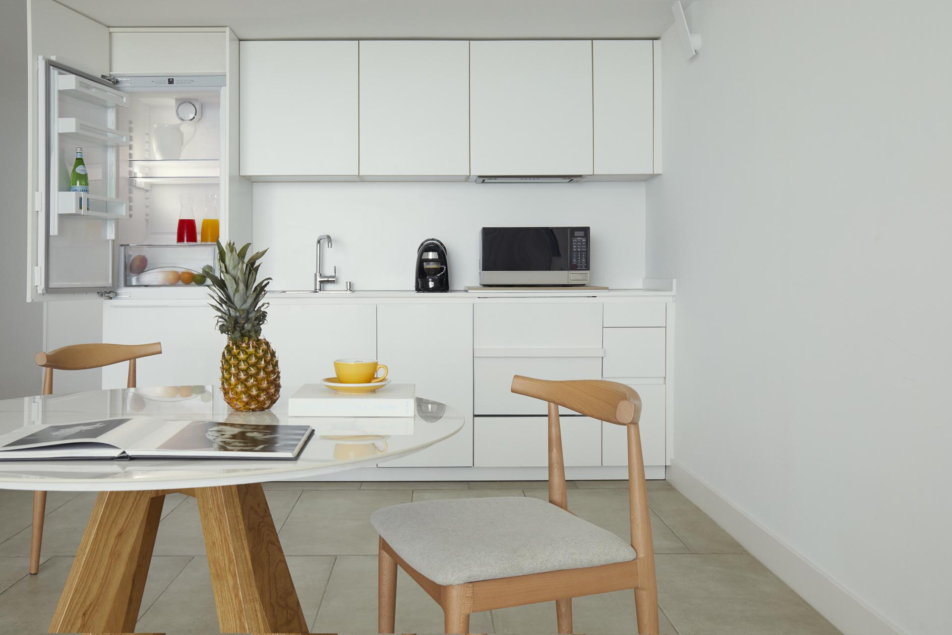 Dining room with a dining table and kitchenette