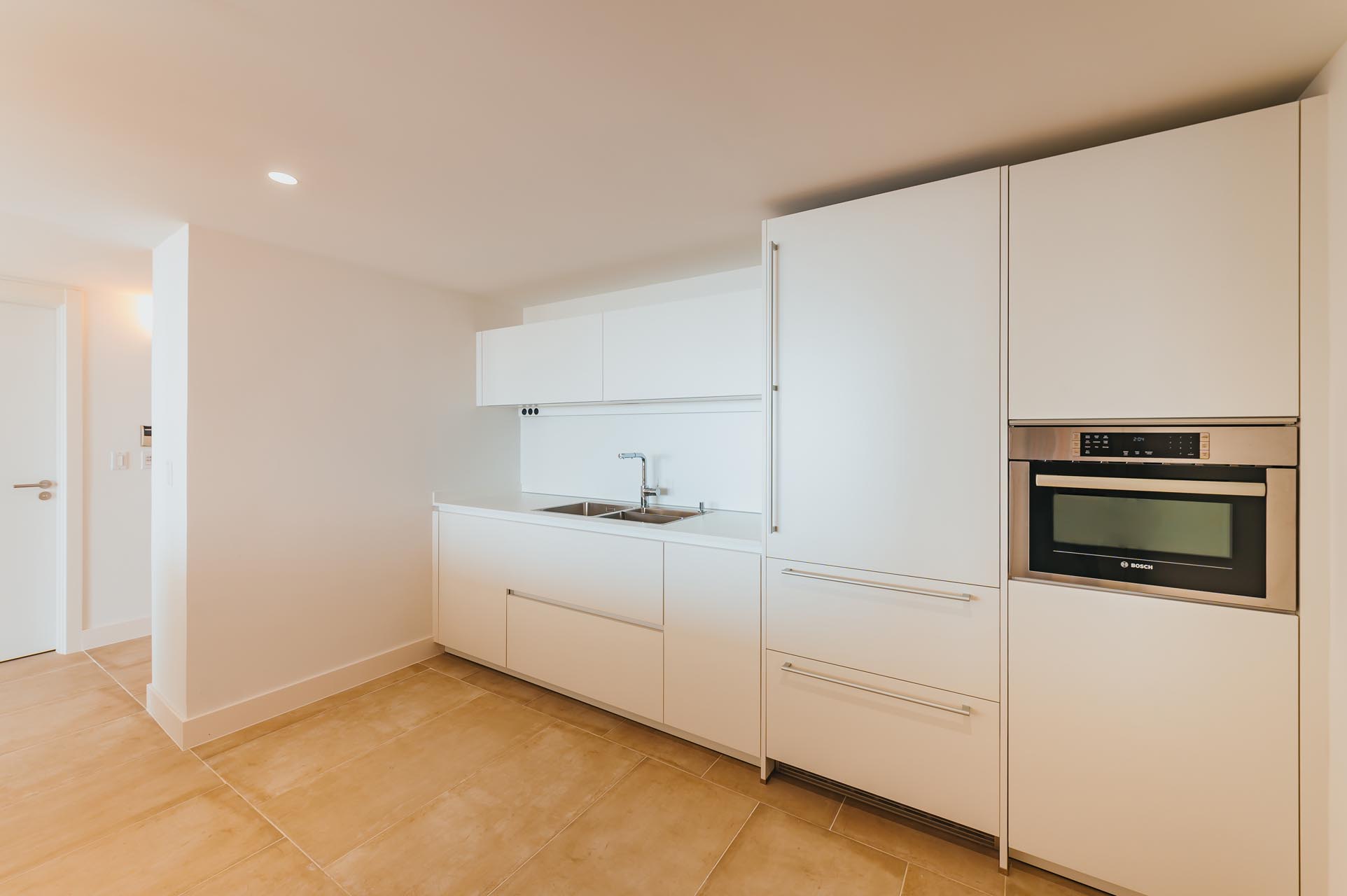 Kitchen with microwave and sink