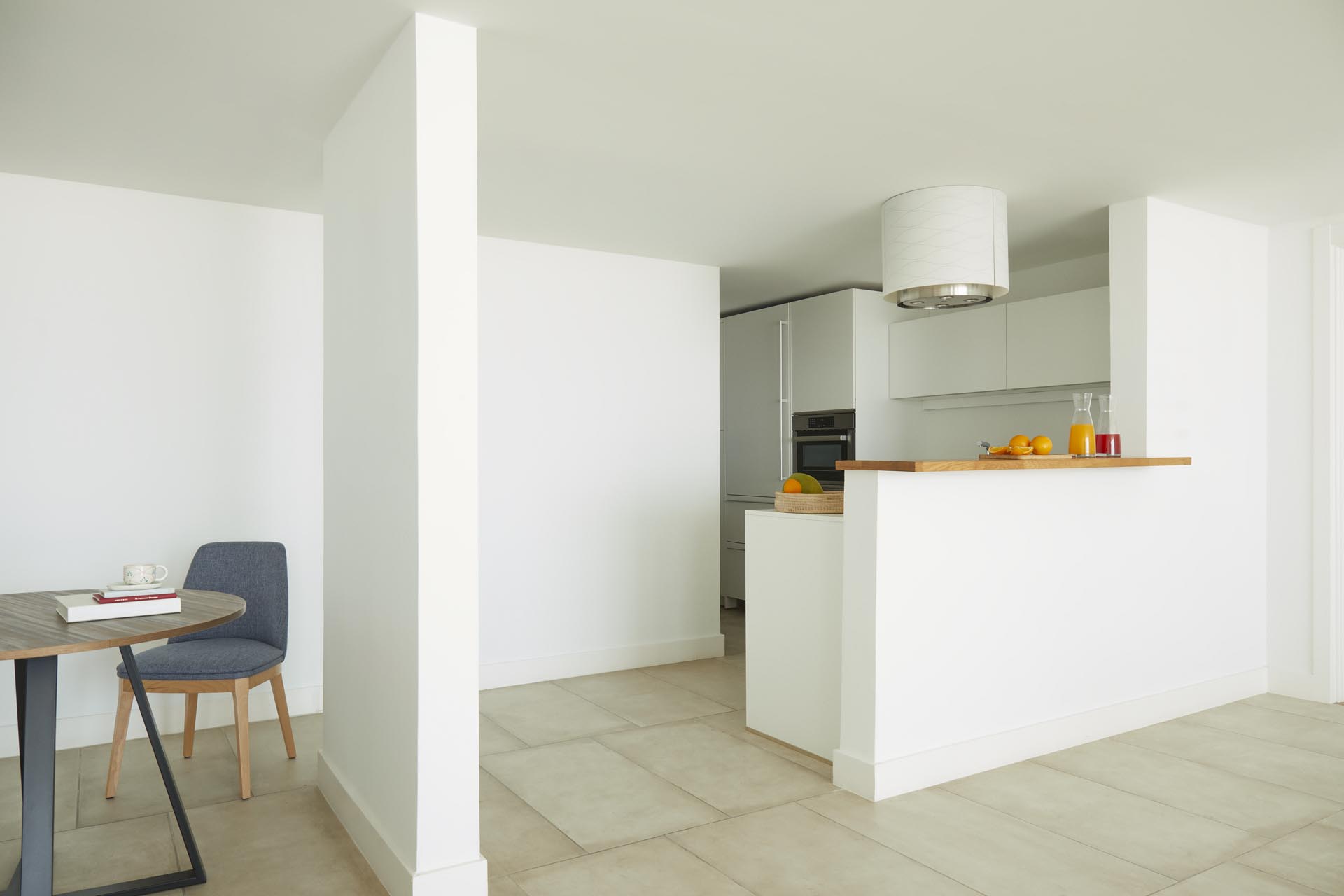 Kitchen counter with sink and chandelier 