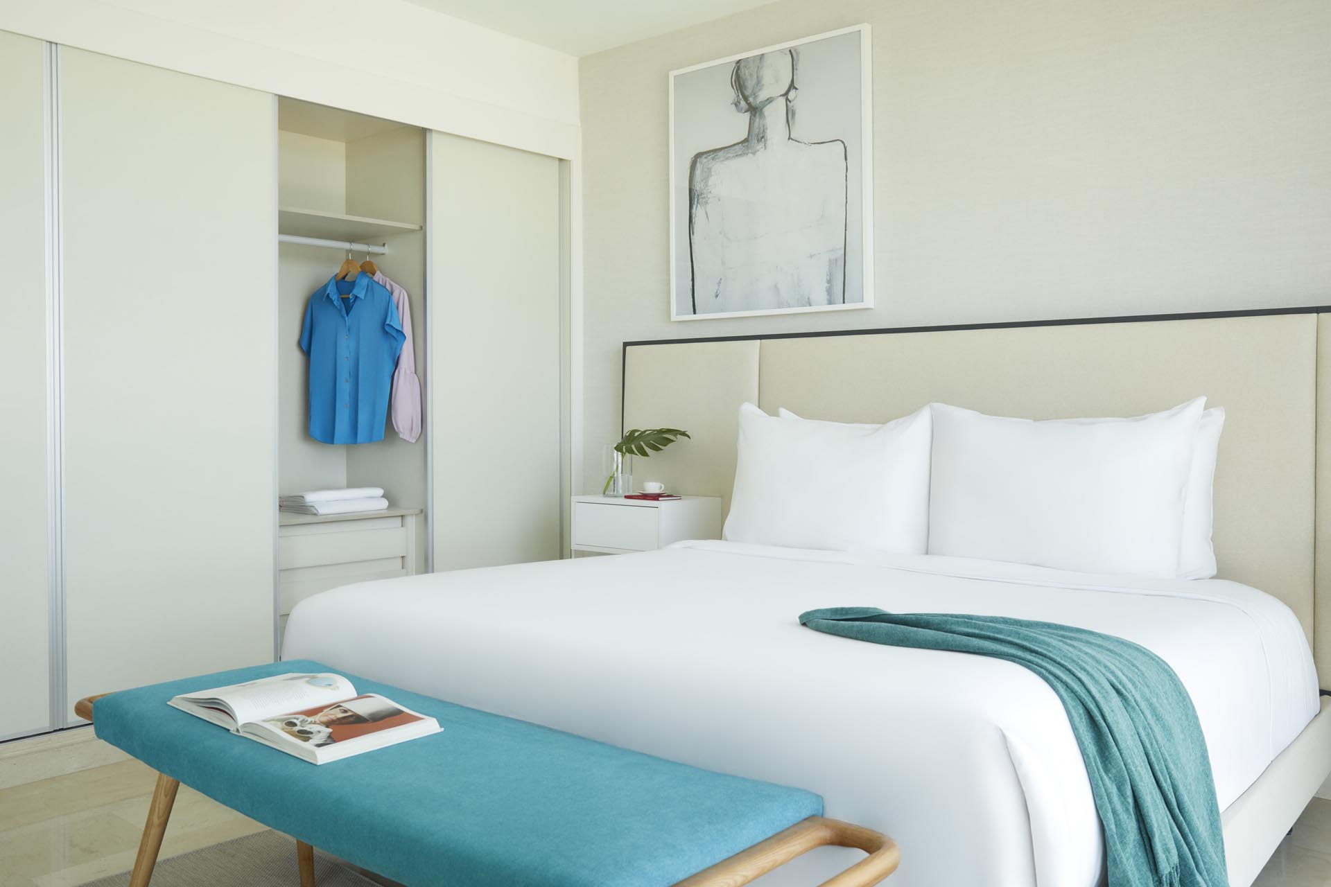 King bed with side table and seating area